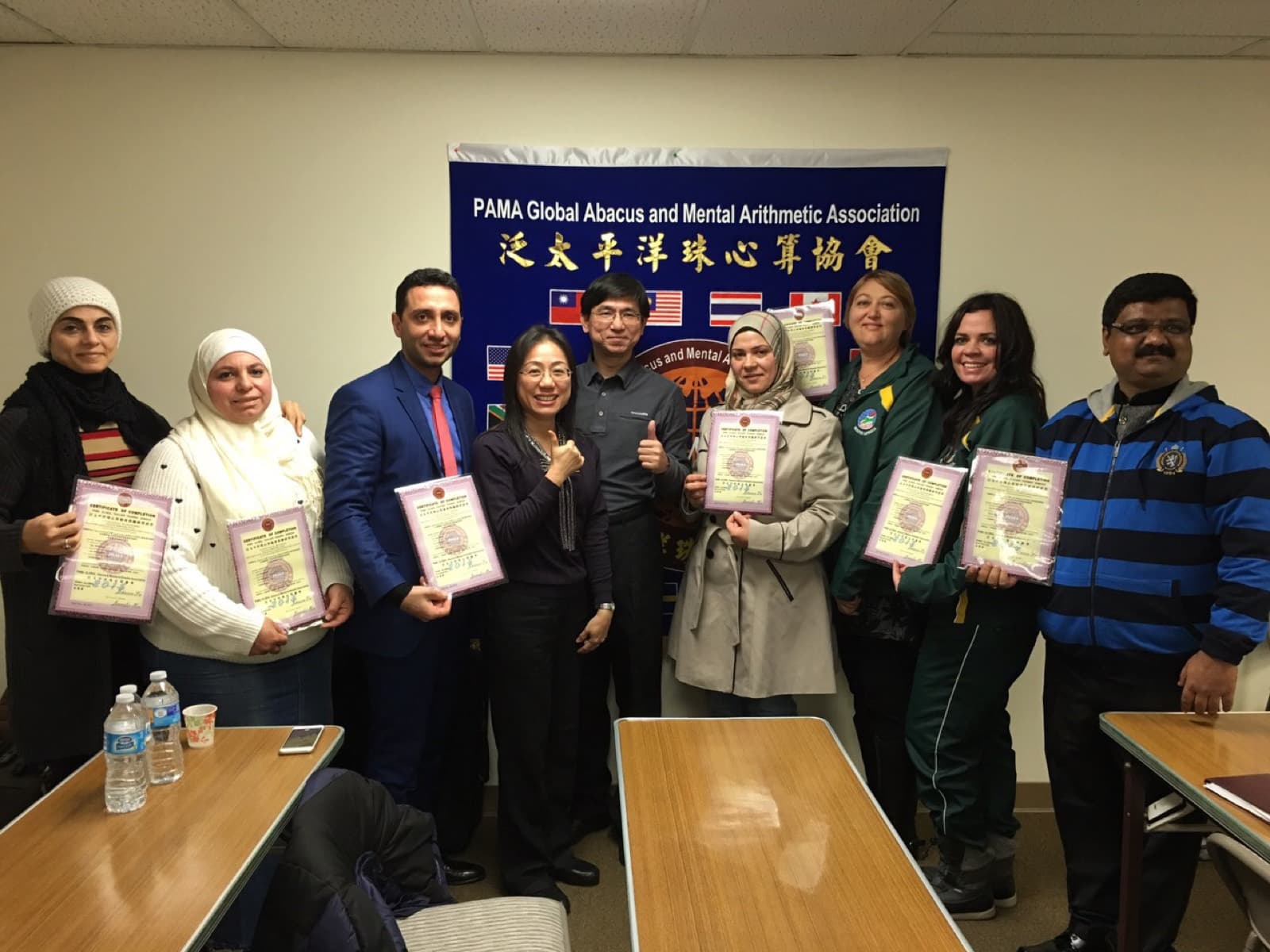 Certified teachers from many countries holding their PAMA certificates